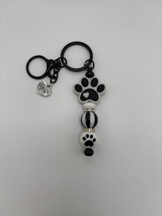 Black & White Paw Print Keychain with Stripe Bead – Cute Pet Lover Gift - Dog Mom Accessory