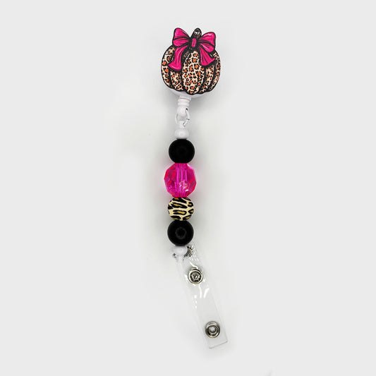 Pink Bow Pumpkin Badge Reel with Pink Faceted Bead
