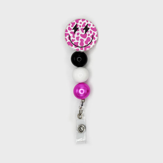 Pink Leopard Smiley Badge Reel