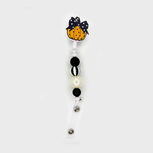 Pumpkin Badge Reel – Classic Polka Dot